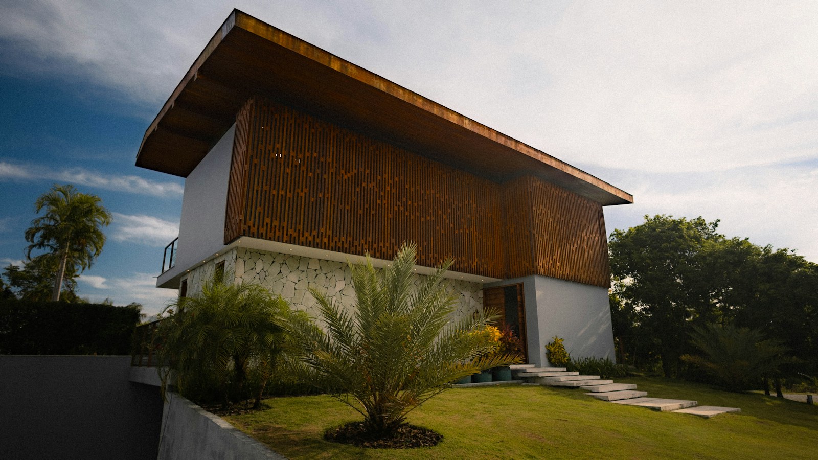 Contemporary home with a broad roofline and landscaped garden